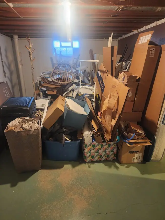 Roll-off dumpster container at job site for 8 Yard Dumpster Rental in Highland